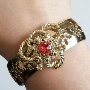 Vintage pink gem cuff bracelet gold tone cutouts